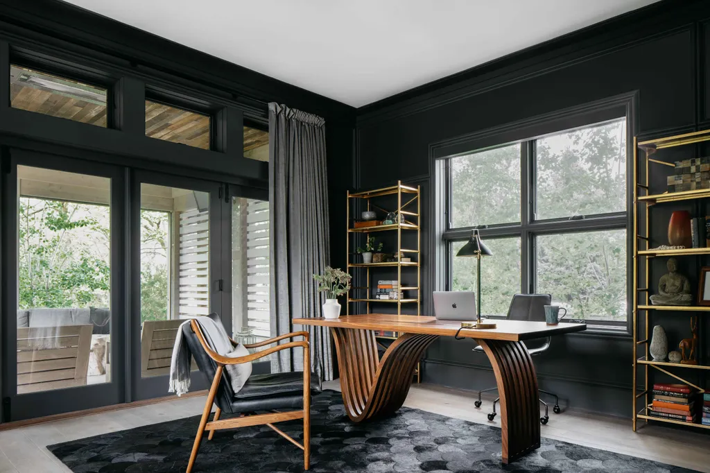 Stunning dark-painted home office with modern design