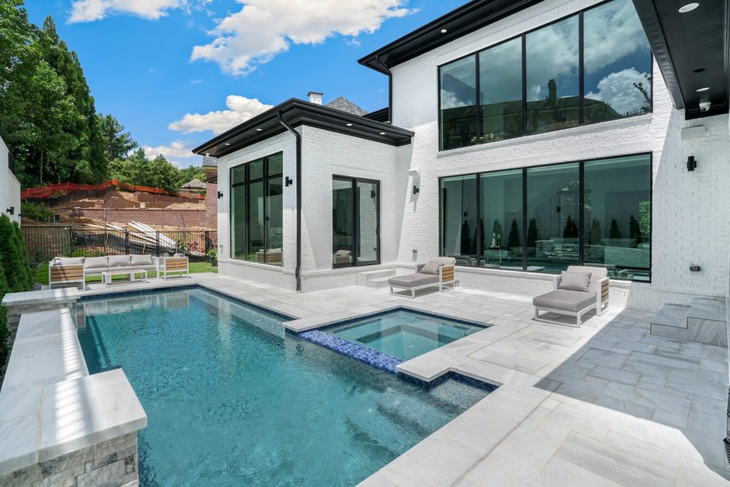 Modern home exterior with pool